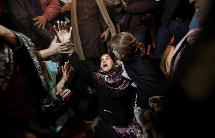 Salman Taseer Funeral: A Pakistani mourner grieves during the funeral procession of Salman Taseer