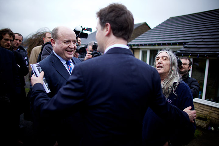 Nick Clegg in Oldham: Nick Clegg comes to the aid of Mr Watkins confronted by Peter Mellor