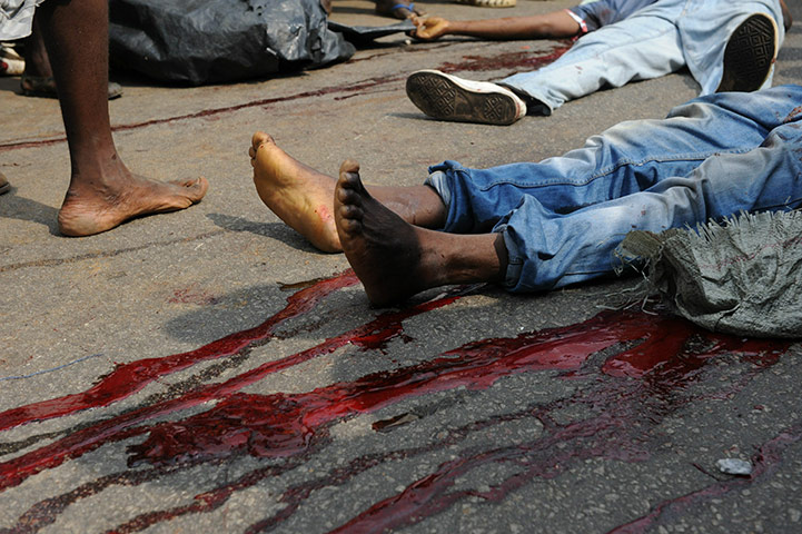 Ivory Coast crisis: bodies of two men reportedly killed by Ivorian police