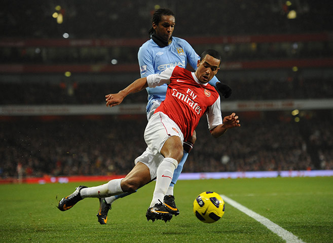 Arsenal v Manchester City: Manchester City's Jo keeps an eye on Theo Walcott