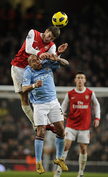 Arsenal v Manchester City: Wilshere beats De Jong in the air