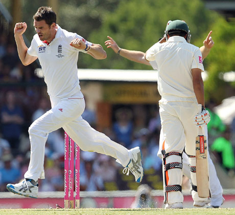 Ashes day four: Jimmy Anderson celebrates taking the wicket of Australia's Usman Khawaja