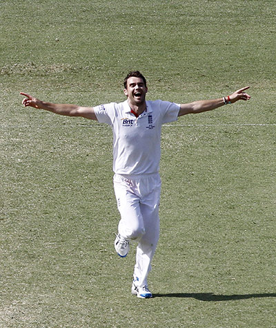 Ashes day four: Jimmy Anderson celebrates taking the wicket of Australia's Michael Clarke