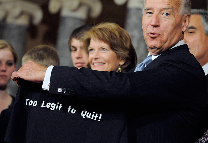 Washington back to work: Lisa Murkowski hands Joe Biden one of her campaign t-shirts