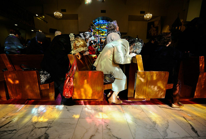 24 hours in pictures: Armenians celebrate Christmas mass at St. Garabed Armenian Apostolic Church