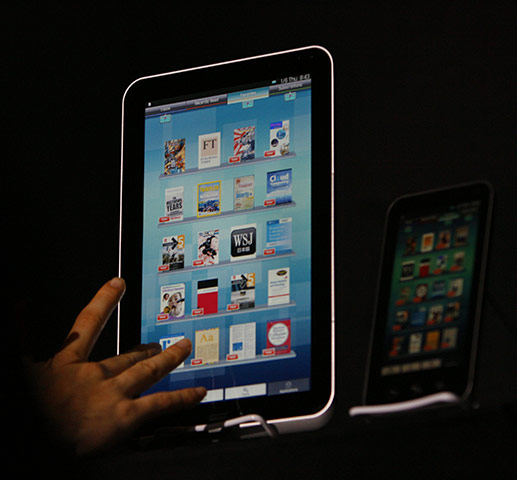 Consumer Electronics Show: Sharp displays its new Galapagos tablet during a press conference