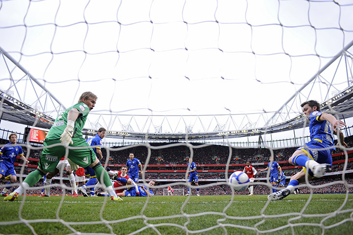 Arsenal v Leeds: Leeds captain Jonathon Howson clears the ball from his own goal-line