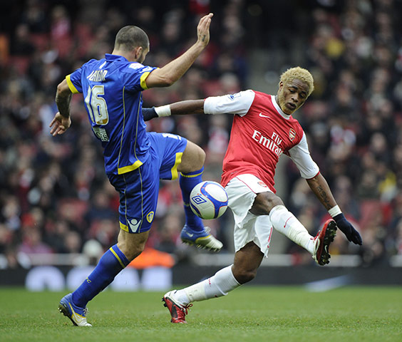 Arsenal v Leeds: Bradley Johnson and Alex Song tussle for the ball