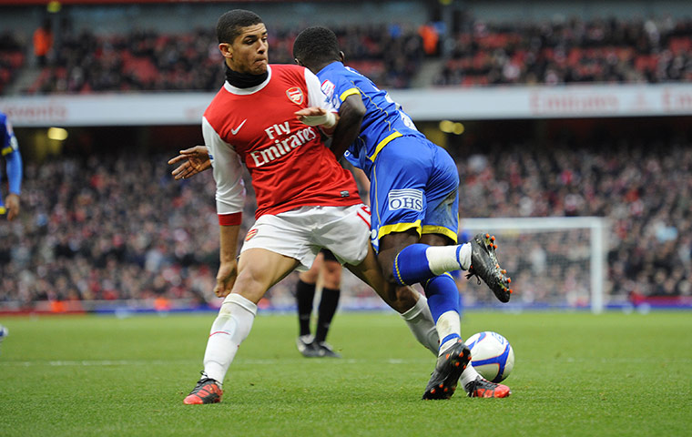 Arsenal v Leeds: Denilson trips Gradel and gives away a penalty