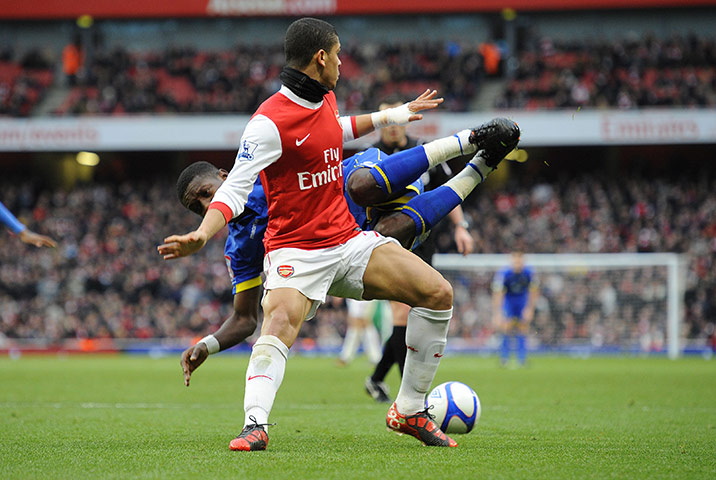 Arsenal v Leeds: Denilson trips Gradel and gives away a penalty