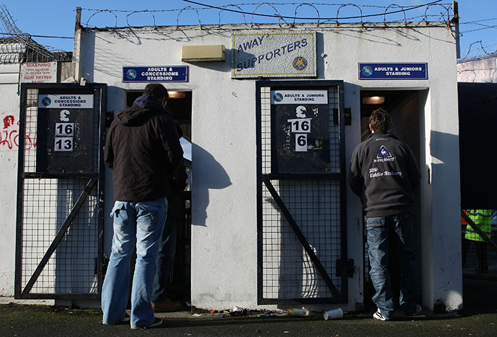 Torquay v Carlisle: Carlisle United fans enter the turnstiles
