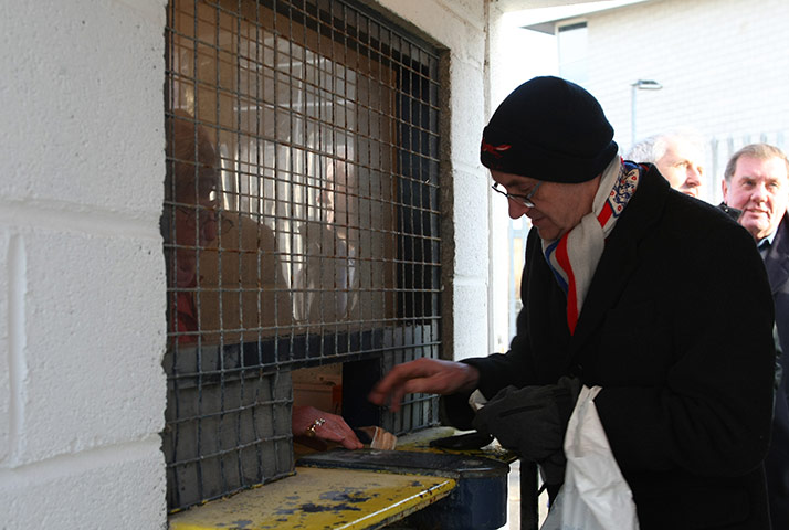 Torquay v Carlisle: Carlisle United fans enter the turnstiles before kick off