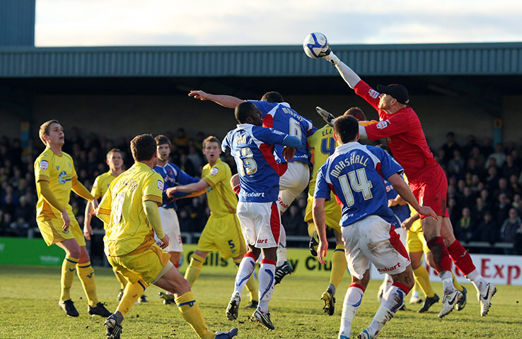 Torquay v Carlisle: Torquay United goalkeeper Scott Bevan punches the ball clear