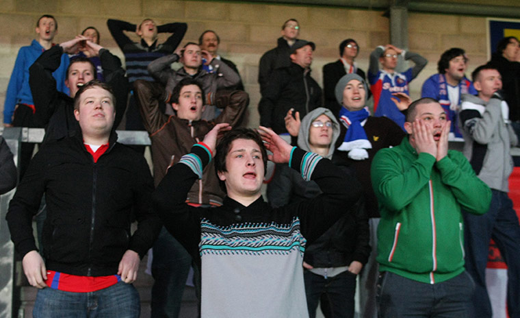 Torquay v Carlisle: Carlisle United fans show a look of dejection