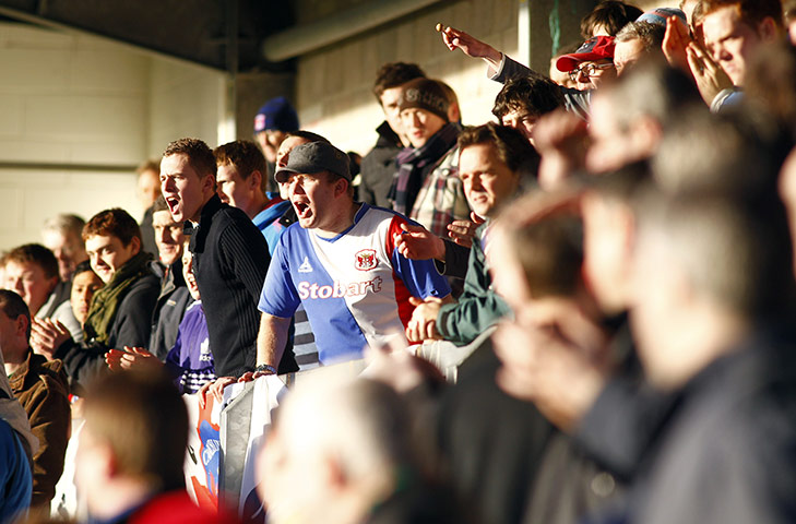 Torquay v Carlisle: Carlisle United fans cheers their team on 