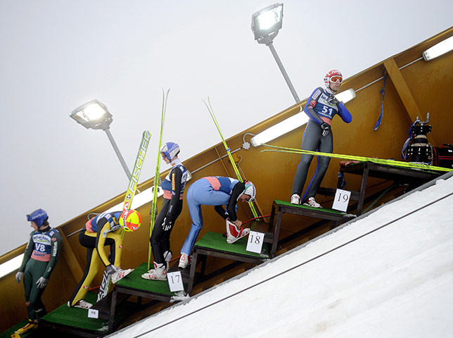 24 hours: Harrachov, Czech Republic: Competitors prepare at the Ski Flying World Cup