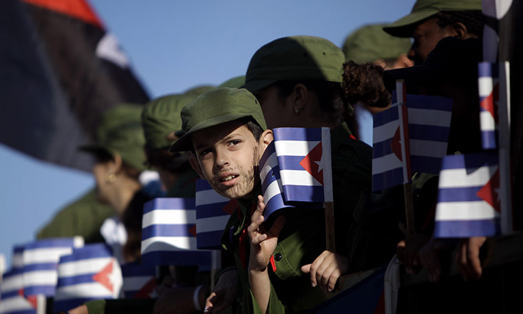 24 hours: El Cotorro, Cuba: Children dressed as revolutionary guerrilla fighters