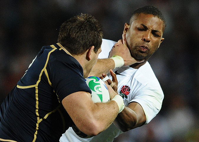 England v Scotland: Scotland's Sean Lamont hand's off England's Delon Armitage 