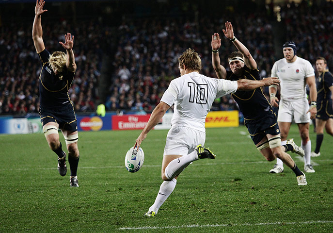 England v Scotland: The Scottish defence attempt to charge down a Jonny Wilkinson clearance