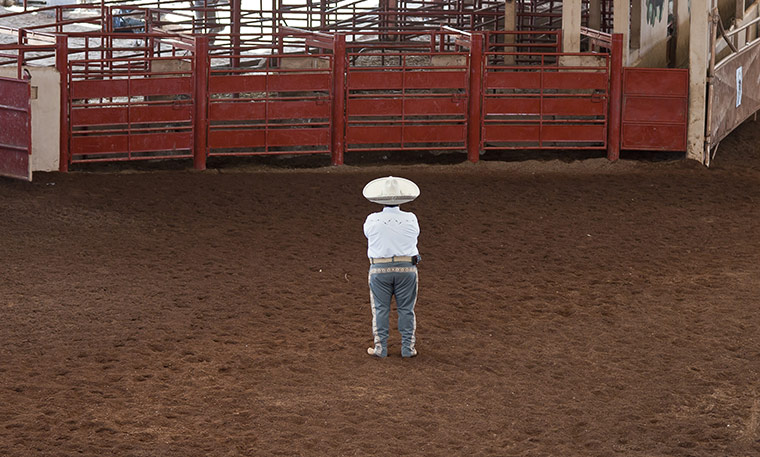 24 in pictures: A guard of the rodeo waits for the escaramuzas teams in a rodeo in Mexico