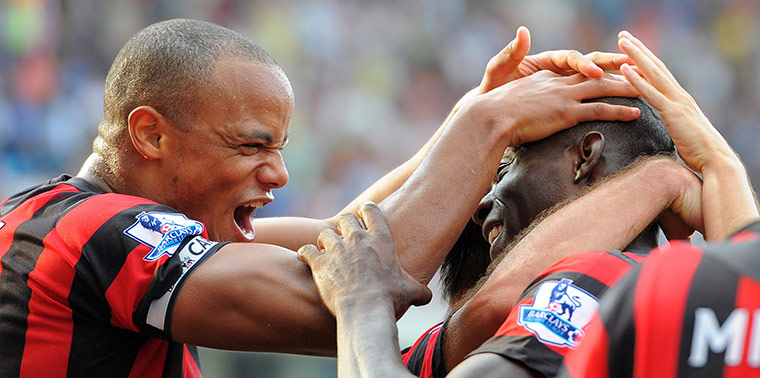 Saturday Roundup: Vincent Kompany congratulates Mario Balotelli after he scored