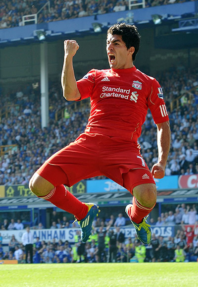 Saturday Roundup: Luis Suarez celebrates scoring against Everton