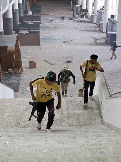 Sirte by Peter Beaumont: NTC fighters inside the Ougadougou convention complex