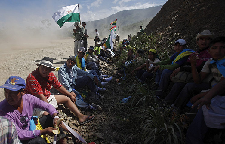 Bolivia Tipnis protests: 9 October: Marchers rest during their advance towards La Paz