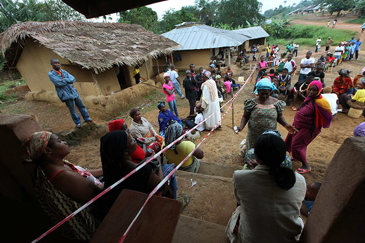 Liberia elections: People wait to vote during the presidential election 