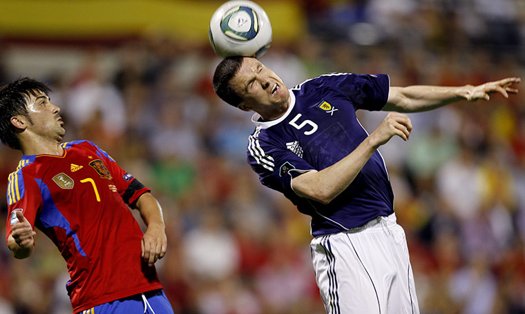 Euro 2012 Qualifiers: Scotland's Gary Caldwell beats David Villa in the air