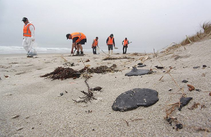 Rena oil spill: on Papamoa Beach near Tauranga , New Zealand