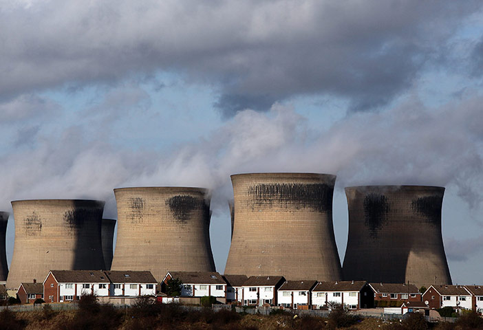 Week in Business: Residential homes by Ferrybridge power station as it generates electricity 