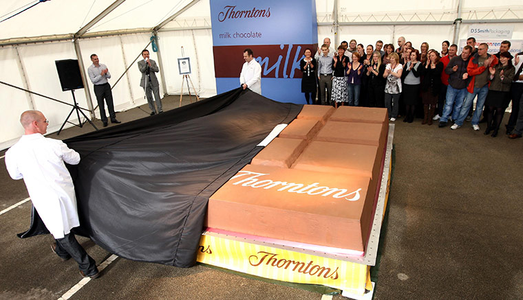 Week in Business: Employees unveil Thorton's giant chocolate bar at the company's HQ