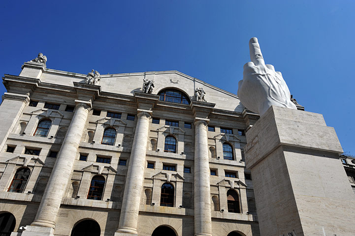 Week in Business: A sculpture by Italian artist Maurizio Cattelan at the Milan stock exchange