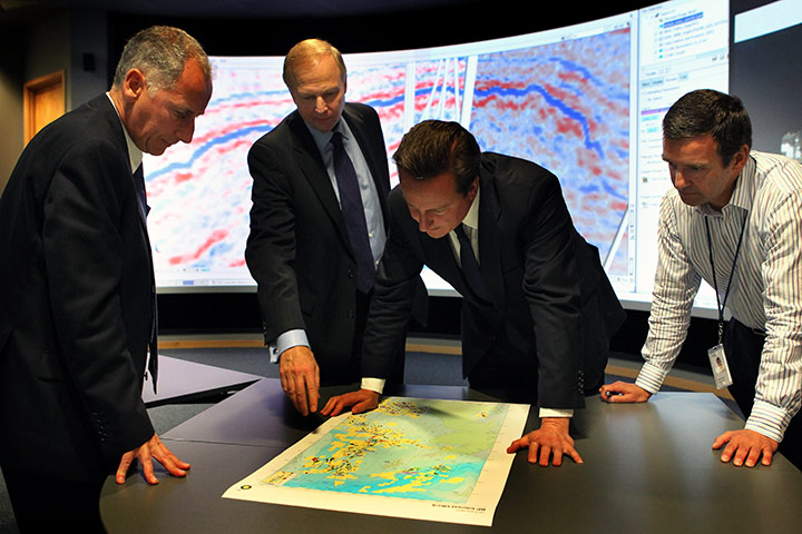Week in Business: Prime Minister David Cameron and BP executives view an exploration map