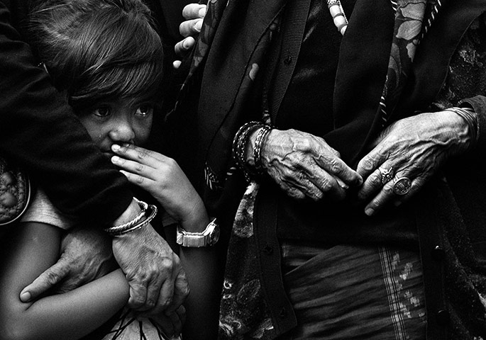 Wootton Bassett: Mourners react as the repatriation cortege passes