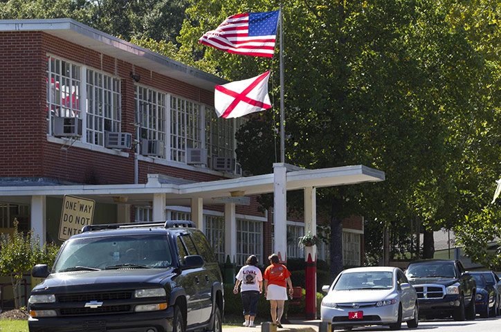Alabama immigration: Mothers arrive to pick up their children from Flowers School in Montgomery
