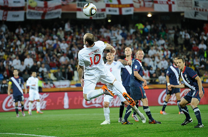 Rooney's tournament woes: Wayne Rooney goes for a header against the USA in the 2010 World Cup