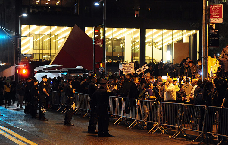 Occupy Wall Street: Police stand outside Zuccotti Park as protesters gather