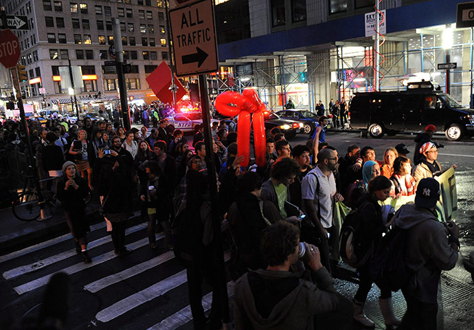 Occupy Wall Street: Protesters march down Broadway