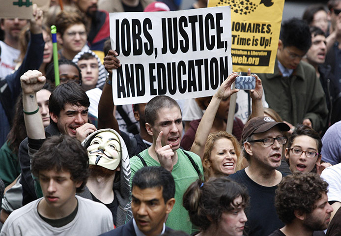 Occupy Wall Street: Occupy Wall Street protesters partake in a celebratory march