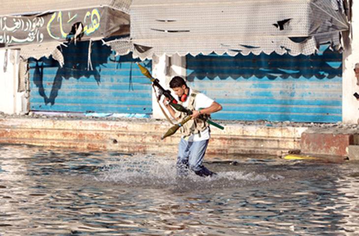 Libya, Sirte: A member of Libya's National Transitional Council fighting in Sirte