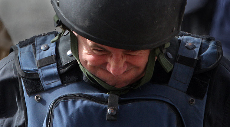 Liam Fox: 1 October 2010: Liam Fox, in body armour and helmet