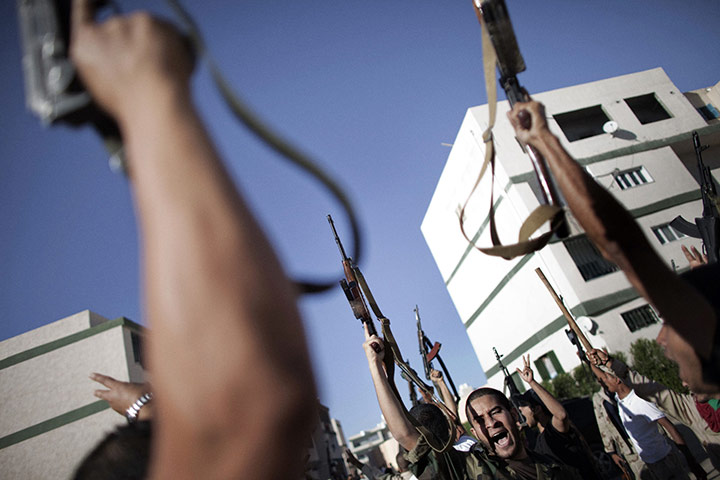 24 Hours: National Transitional Council fighters celebrate in Tripoli