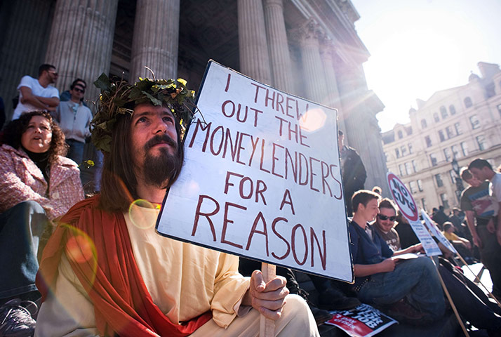 Occupy London: A man dressed as Jesus sits amongst other protestors at Occupy London