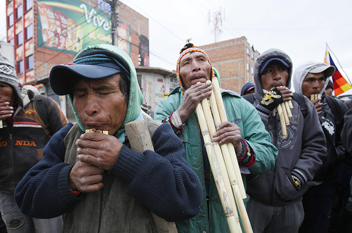 Week in music: Supporters of Bolivia's President Evo Morales play traditional Andean music