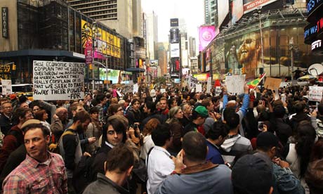 Demonstrators associated with the Occupy Wall Street' movement protest in Times Square