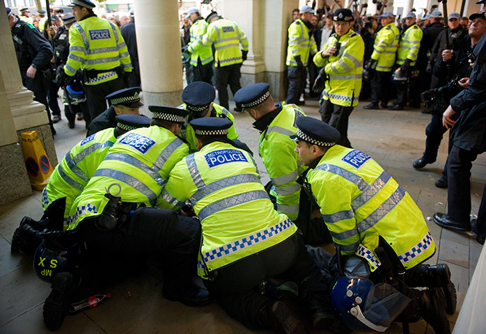 Occupy London protests: Oct 15: Police arrest a man outside St Paul's Cathedral 