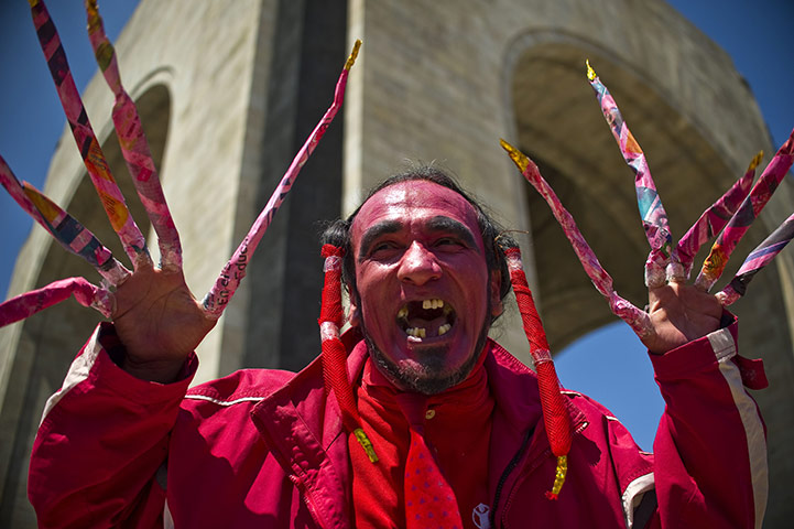 Occupy protests: A man dressed like a devil protests in Mexico City