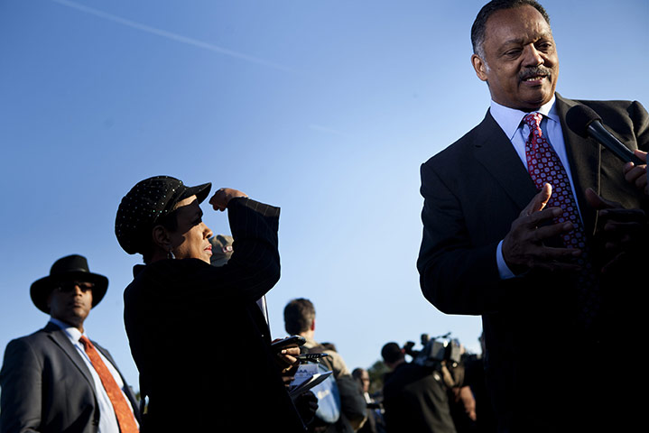 Martin Luther King: Rev. Jesse Jackson speaks to a reporter before a dedication ceremony 